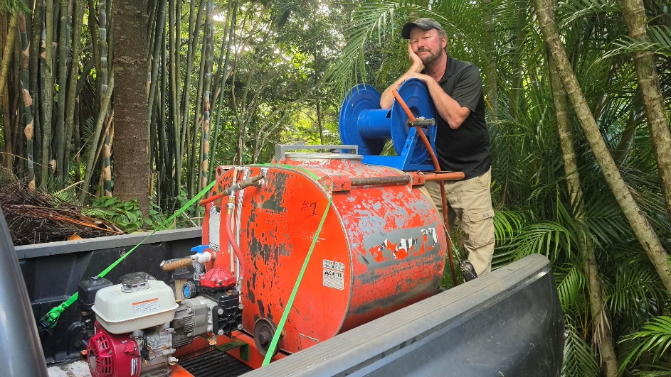Todd Johnson with a truck bed mounted spray tank